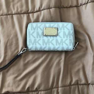 Michael Kors wallets/ wristlet
